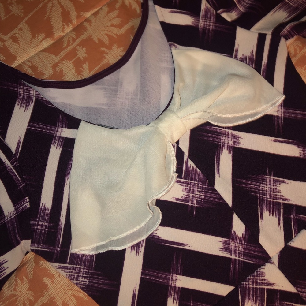 White and purple dress with bow on back
